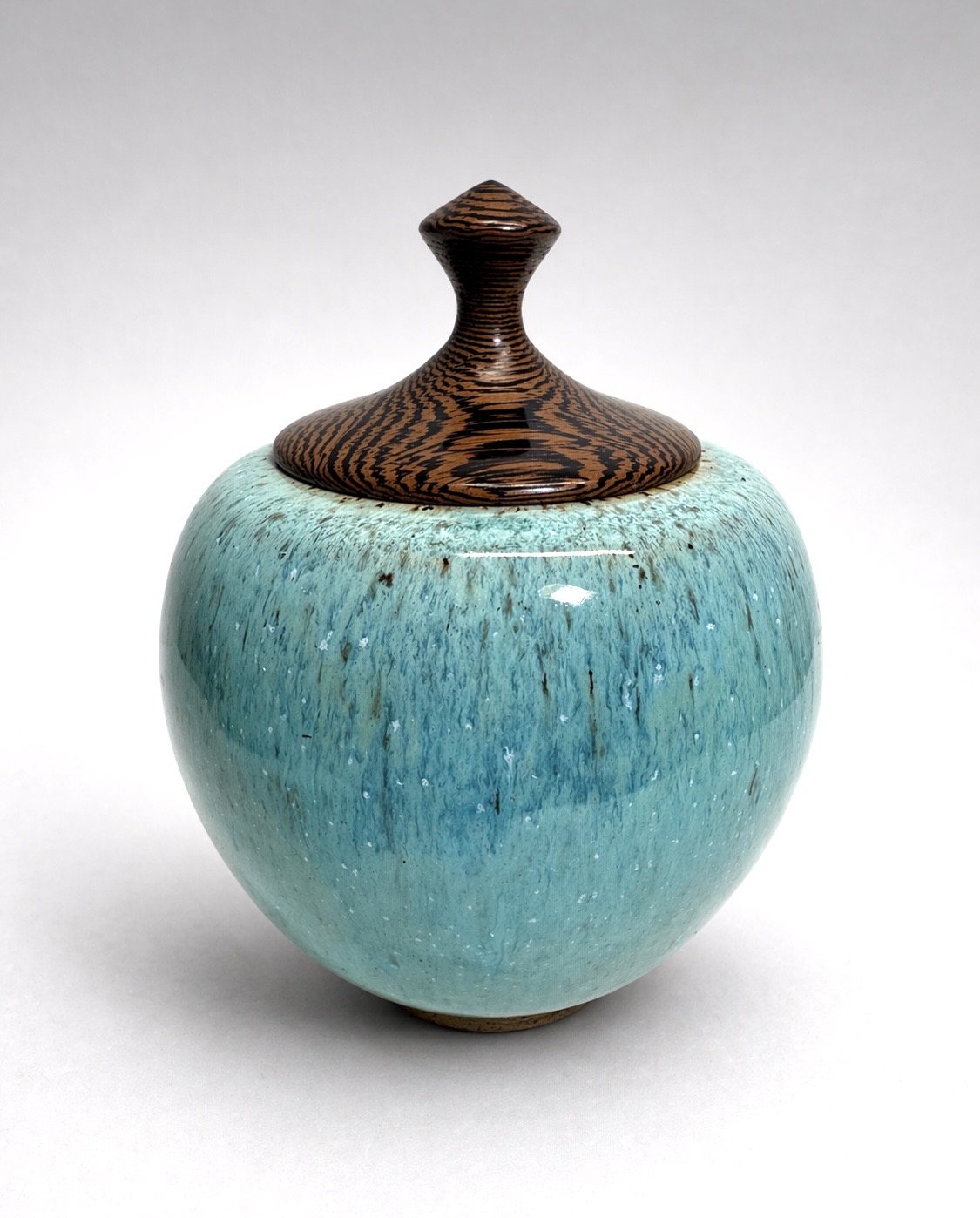 Jar with turned wood (Wenge) cover and layered glazes